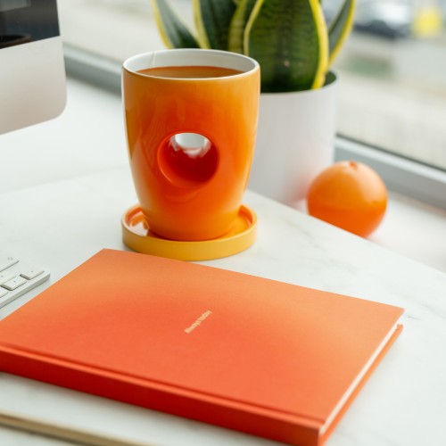 Helio Ferretti | Hand Warmer Mug | Orange